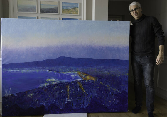 Luca Raimondi in the Studio: at my studio with a landscape painting ready for a new home