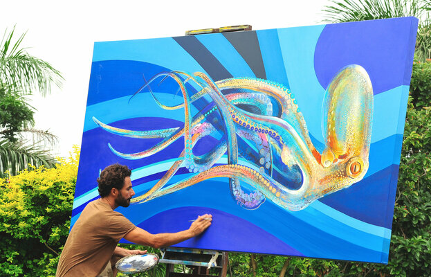Everett Duarte in the Studio: Everett Duarte working outside his studio in South Africa due to the large size of this canvas