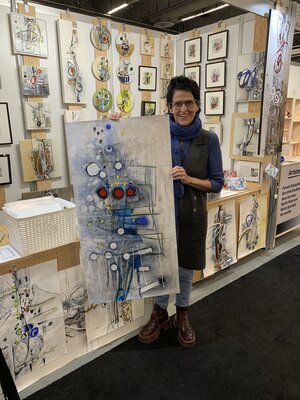 Sylvie Cloutier in the Studio: DEVANT MON KIOSQUE AU SALON DES MÉTIERS D'ARTS DU QUÉBEC, ICI AU CANADA,  DÉCEMBRE 2024
