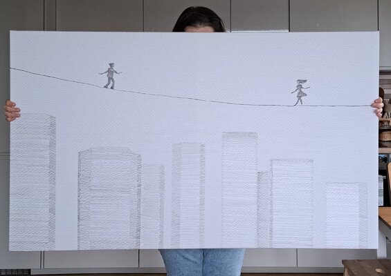 Painter Coded in the Studio: The artist holds 'Over the City #1' in their hands.