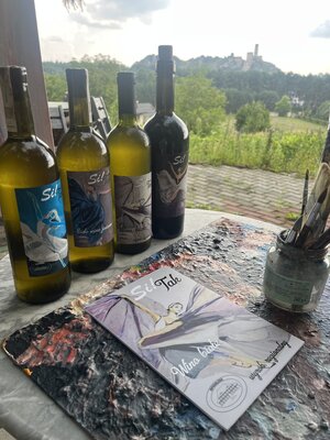 Kamila Sitak in the Studio: painting in the Si!tak wineyard, all bottles presented with my paintings
