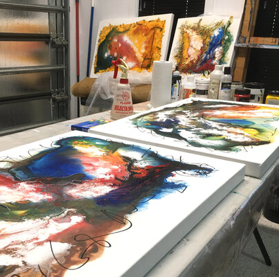 Bruce Peebles in the Studio: Working on the Central Australia Experience series. Artworks shown are Billabong Edge, Billabong Flow, Desert Range and Desert Wind, all available through Singulart.