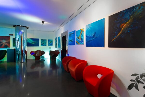 Alessandro Piras in the Studio: Inside Hotel Duomo in Rimini, my paintings hanged up on the walls of the hall.