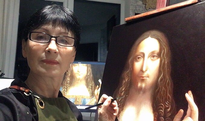Olga Begisheva K. in the Studio: Olga Begisheva K. in her art studio. The process of creating an oil reproduction of Leonardo da Vinci's painting "Salvator mundi".
