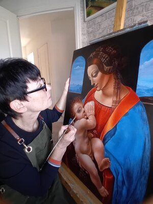 Olga Begisheva K. in the Studio: Olga Begisheva K. in her art studio. Leonardo Da Vinci's "Madonna Litta" oil reproduction
