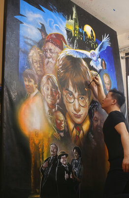 Michael Andrew Law Cheuk Yui in the Studio: Michael Andrew Law working on a Large Drew Struzan's Harry Potter Painting