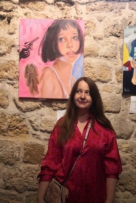 Jane Lantsman in the Studio: Under the Mask of Fame Exhibition, Jaffo Old  Theatre, Tel Aviv. Near my artwork