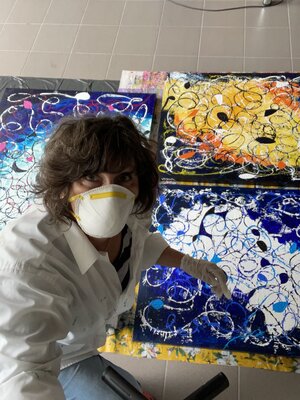 Vesna Jogan in the Studio: Varnishing paintings for exhibition