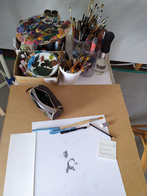Maksym Stasiuk in the Studio: This table holds my quiet rituals: a cup of brushes, a whisper of an idea, and the beginning of a story.