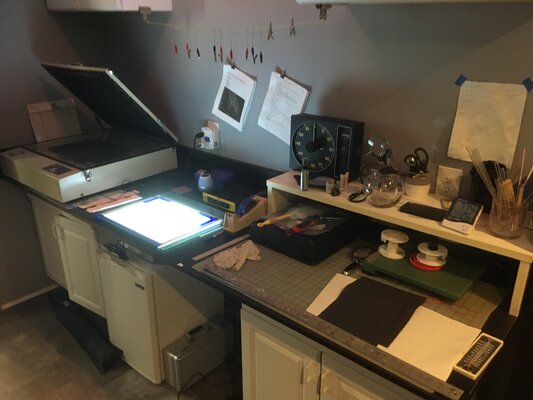 Mark LaRiviere in the Studio: This is my platinum/palladium printing equipment. On the left is a vacuum contact exposure lightbox. On the right, the area where I apply sensitizer to paper.