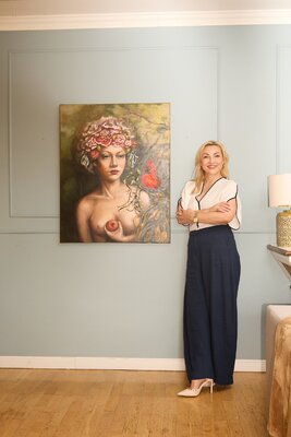 Anna Brańska in the Studio: posing next to my unfinished painting in my studio.