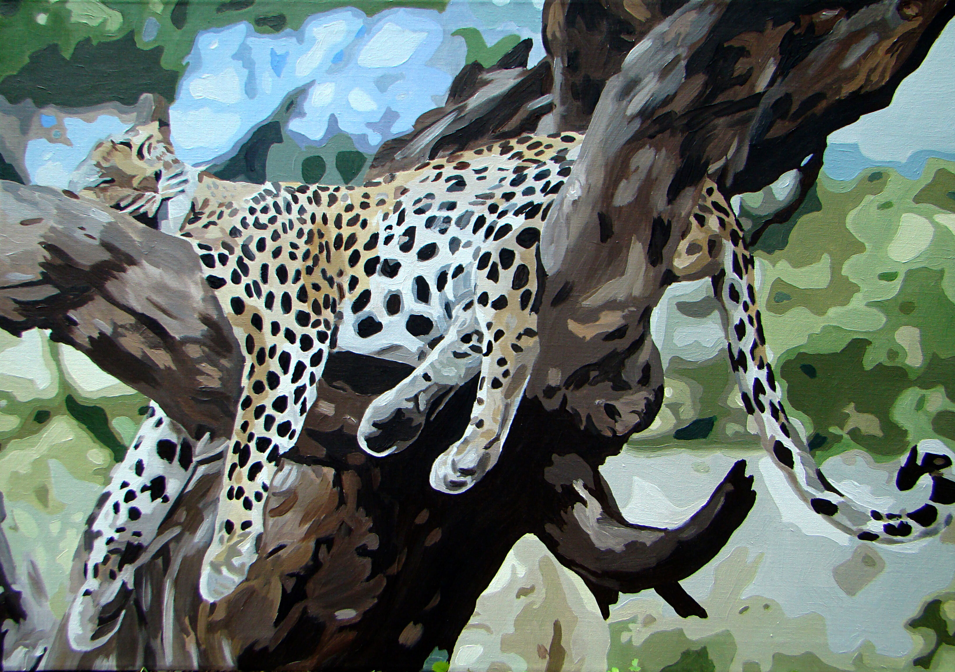 Leopard resting on a tree