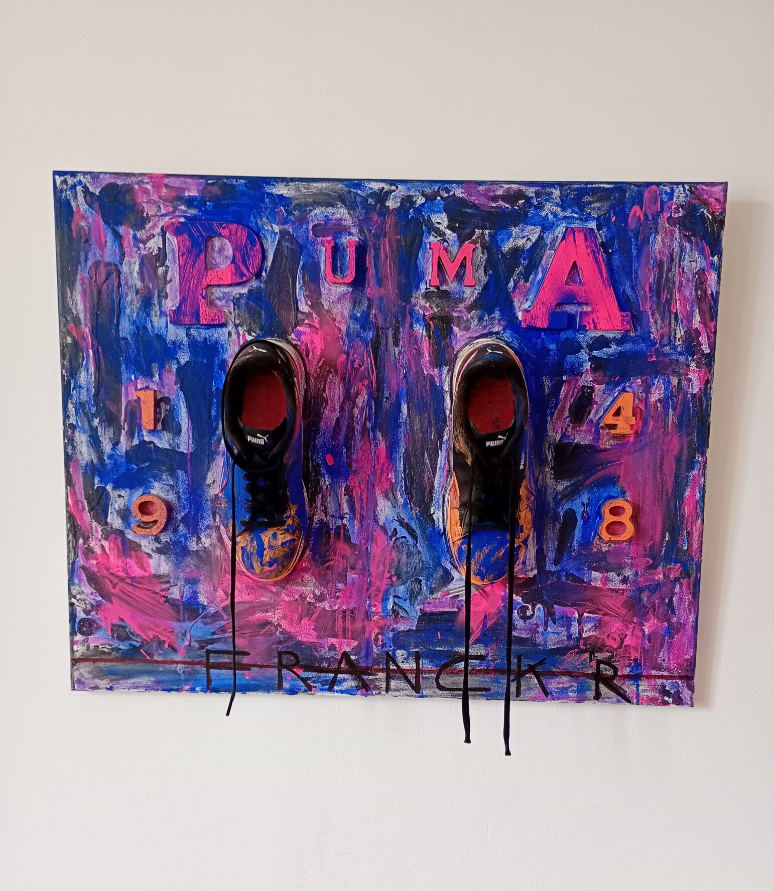 Chaussures Puma porté par L’artiste Franck R , 1948 date de création de la société puma